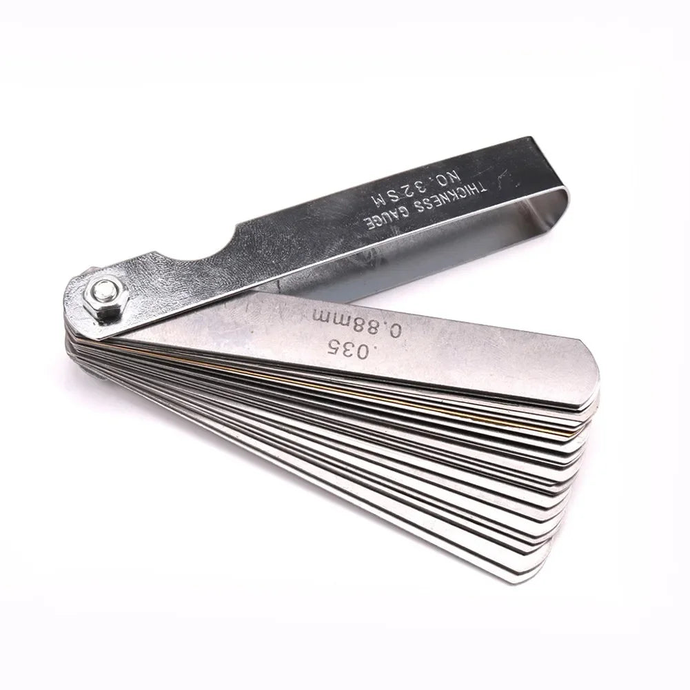 32-blade feeler gauge set for precise guitar neck relief, string height adjustment, and nut slot cutting. Ideal luthier tool for instrument setup.