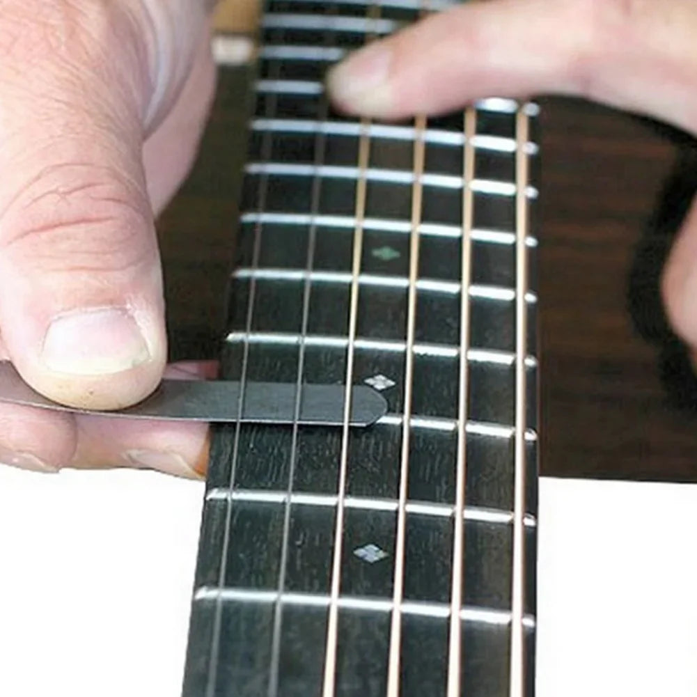 32-blade feeler gauge set for precise guitar neck relief, string height adjustment, and nut slot cutting. Ideal luthier tool for instrument setup.